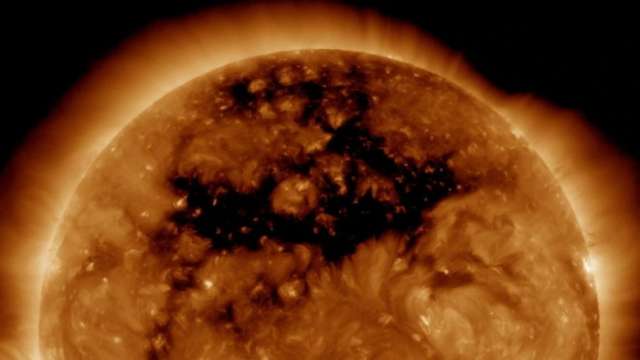Giant hole on Sun's surface: Earth in danger of facing massive solar storm? - Vimarsana News