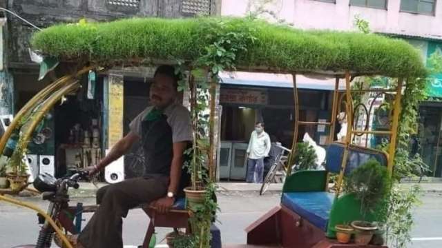Viral: Man turns his rickshaw into mobile mini rooftop garden - Vimarsana News