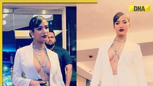 Poonam Pandey goes braless, wears white coat at award night; netizens troll her: ‘Ajeeb lag rahi hai’