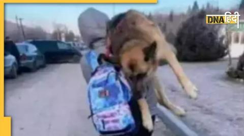 Ukraine woman carried dog on her shoulder