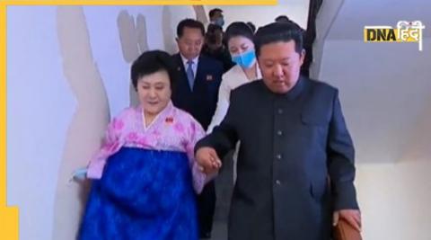 Kim Jong Un with lady anchor