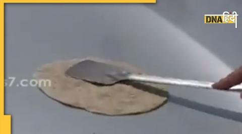 Woman made Roti on car