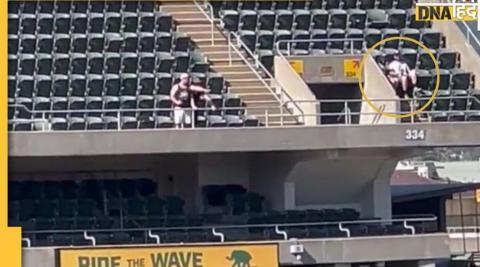 couple intimate in stadium