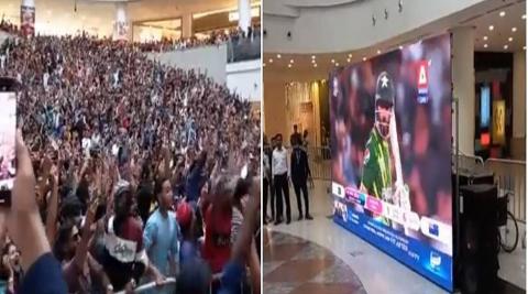 Pakistan fans celebrate in Karachi mall