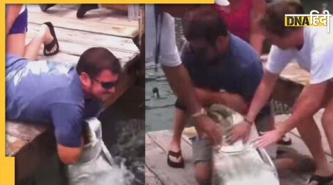 fish attacked man hand bite sea while fishing viral video