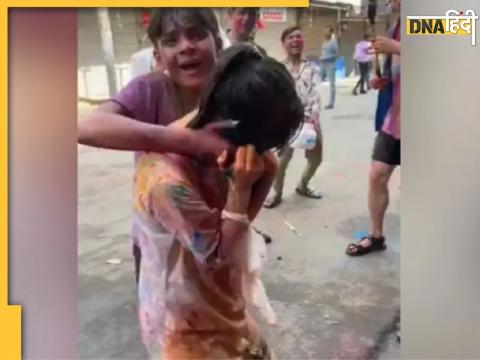 holi Japanese woman forcibly painted colour misbehave  social media viral video 