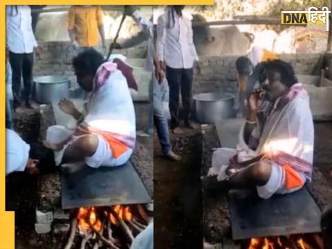 twitter baba sitting stove burning talking bhakts watch viral video