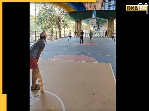 Kids Playing Cricket Under Bridge