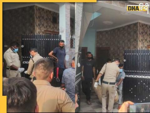 Dehradun के मकान में मिली लाशों को पोस्टमार्टम के लिए लेकर जाती पुलिस.