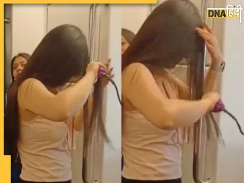 delhi metro girl straightening hair inside coach plug watch viral video 