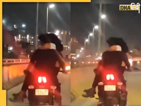 man rode the bike with the girl sitting in his lap