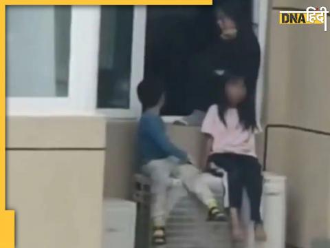 woman hangs children from 23rd floor of the building fighting with husband video viral 