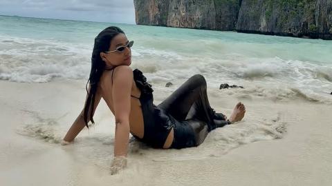 Nia Sharma Flaunts Toned Figure in A Black Swimsuit