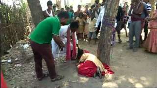 Woman tied to tree, thrashed by villagers for eloping with man from another...