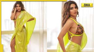 Nikki Tamboli looks sizzling hot in yellow saree, drops photos on Instagram