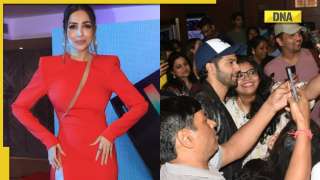 Viral Photos of the Day: Malaika Arora stuns in red dress, Varun Dhawan watches Bhediya with fans