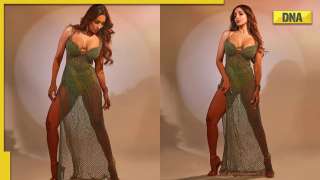 In Pics: Malaika Arora makes internet sweat with her sizzling photos in deep-neck dress
