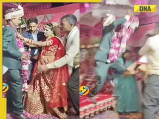 Viral video: Groom's daring leap during varmala ceremony leaves internet in stitches, watch