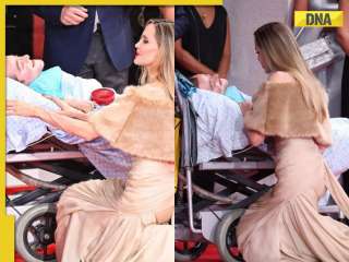 In pics: Angelina Jolie wins hearts as she kneels down to talk with bed-ridden fan at Maria premiere