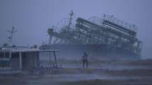 Powerful typhoon nears Tokyo after losing some strength