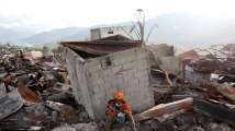 Missing toll soars to 5,000 in engulfed Indonesia quake neighbourhoods
