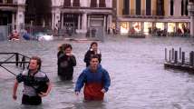 Deadly storms lash Italy leaving Venice afloat