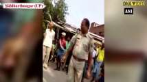 Man beaten black and blue on the road over Challan by UP Police in Siddhart...