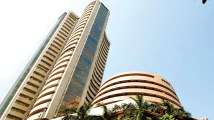 Sensex dives 97 points in a highly volatile session, Nifty slips below...