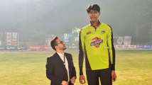 At 7ft 6ins, this giant from Pakistan aims to be tallest bowler in wor...