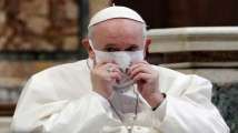 Pope Francis wears mask for first time at public service