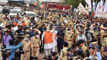 GHMC polls: Amit Shah arrives in Hyderabad for roadshow; offers prayer...