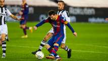 Lionel Messi reaches two milestones as Barcelona wins tough match at C...