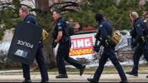 At least six, including police officer, killed in US supermarket shoot...