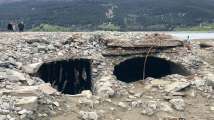 In pics: Lost village emerges from lake after over 70 years