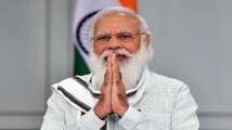 PM Modi to interact with beneficiaries of PMGKAY in Gujarat to create...