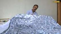 Kashmiri artisan making old map of Srinagar to retain culture