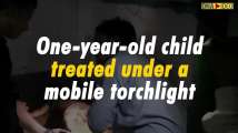 One-year-old child treated under a mobile torchlight