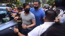 In Pics: Shah Rukh Khan mobbed by paparazzi as he visits son Aryan Khan at...