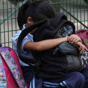 Mirzapur: Angry school principal hangs kid upside down from building, DM orders probe - Vimarsana News