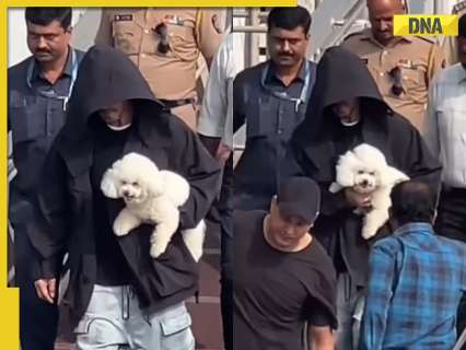 Shah Rukh Khan gets papped while holding pet dog, hides his face in hoodie, gives major fashion goals: Watch